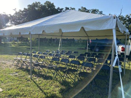 20x20 tent & black folding chairs