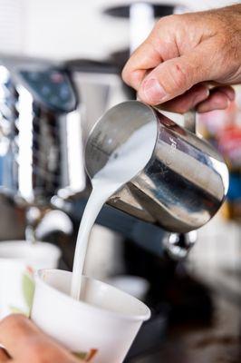 milk pour professional barista for latte