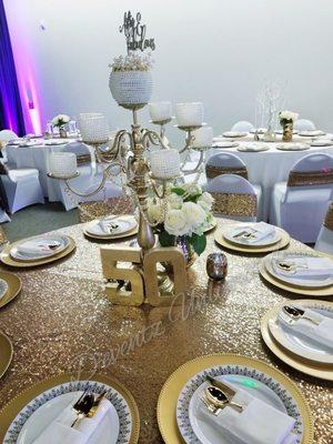 50th b-day table setting with white and gold theme