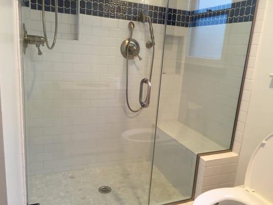 Tub was  removed and replaced with double shower , two shower heads and niches, and a bench.  We love it, so do all our friends.