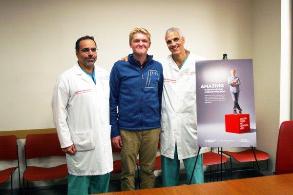 Dr. Patsalides & Dr. Souweidane with Brandon Hibbs, who survived a life-threatening brain infection.