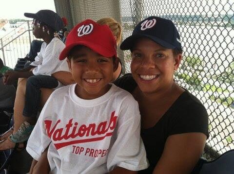 A mentee enjoying a Nats game with his mentor