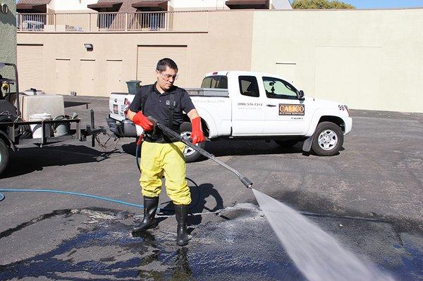 Power wash your parking lot spills and grease away.