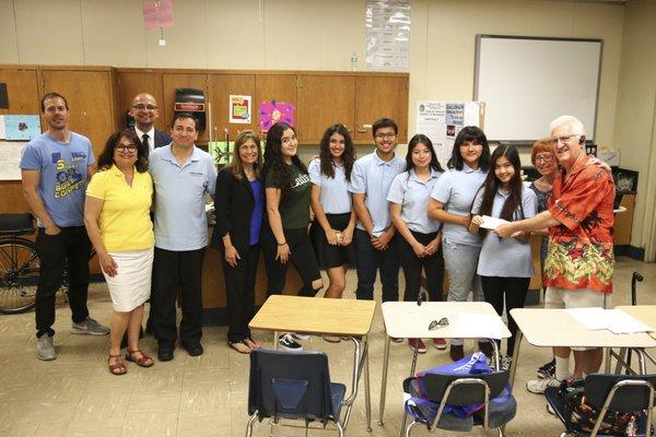 Garey High School InvenTeam & School officials, with Jeff and myself presenting checks from money we raised to send them to Cambridge.