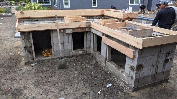 Prep work for outdoor kitchen, with concrete countertop