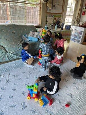 In the free play time playing with blocks