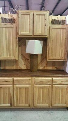 Knotty Hickory cabinets are a favorite for a rustic style house.