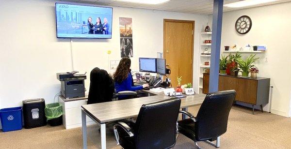 Alice working in her office