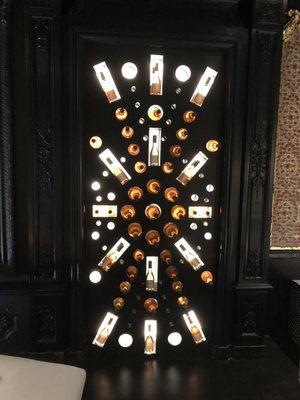 Bottle storage in basement bar