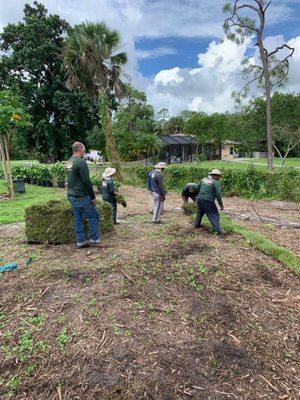 laying sod at a customer's property in the estates