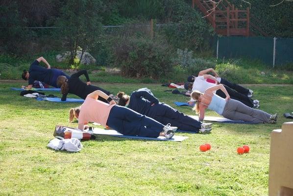 Adventure Boot Camp fitness program in Santa Monica takes women through some cores stability exercises to shape up the belly.