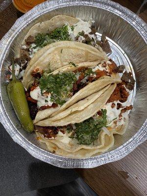 Tacos with Mexican cheese on top: Steak, pastor and chorizo