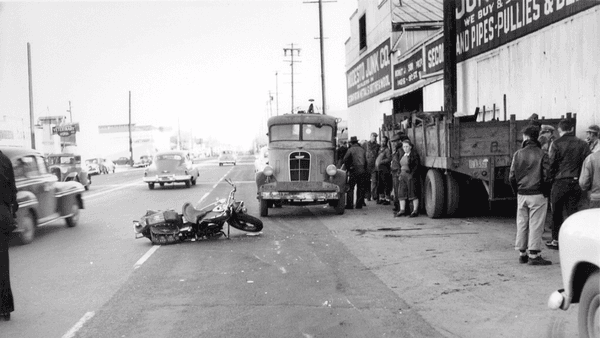 An old photo of the street/sidewalk area in front of Modesto Junk Company that we came across