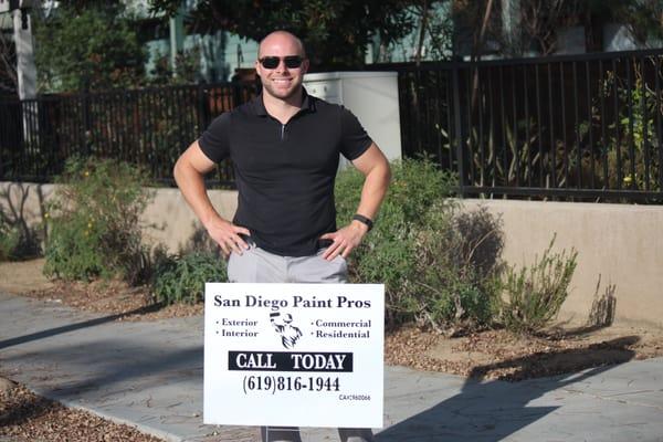 The owner, Casey, at a recently completed HOA project in North Park