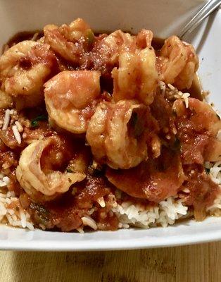 Fire Cracker Shrimp. Simmered in Adobo Sauce with Tomatoes, Garlic.and onions.