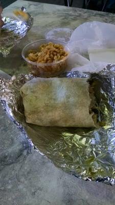 This is a pic of about 1/2 of a MONSTER Jamaican Burrito and a side of the BEST mac-n-cheese EVER!