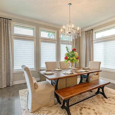 These drapery panels really bolster the elegant look of this dining room, matching the color scheme perfectly...