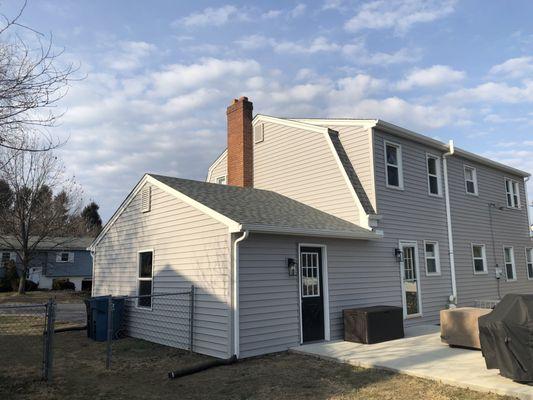 Vinyl siding with asphalt shingles, seamless gutters and gutter guards in Mechanicsburg, Pa