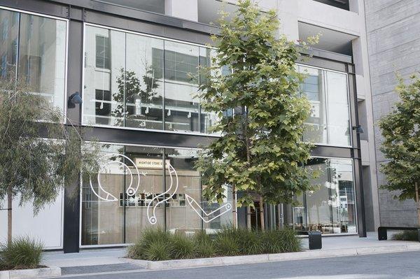 Storefront on Center Street between Alameda and Dock. Inside ROW DTLA parking structure.