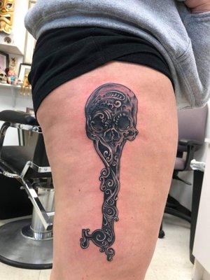 Tattoo of skeleton key by Kevin Brennan