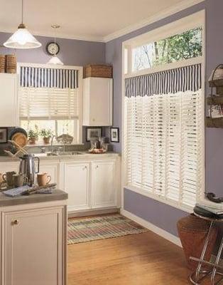 Delta Blinds in Faux Wood, 2" slats boasting the bright white color. Our blinds are moisture resistant and easy-to-clean!