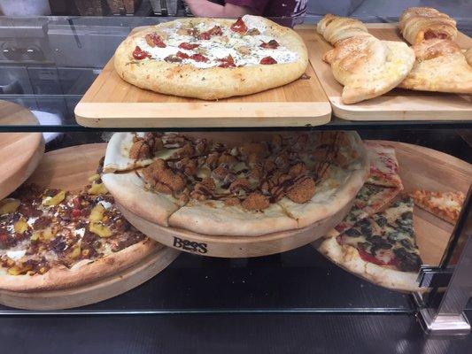 Specialty pizzas +calzones, focaccia pizzas