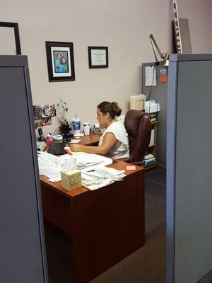 Alicia working hard for our clients!