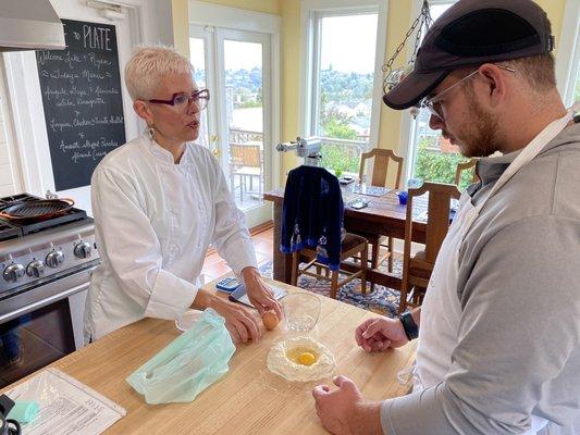 Jennifer explains the science of cooking and history of the dishes all while having you totally drive the hands on cooking experience.