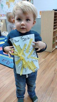 This Preschooler is so proud of his work: "S for Soleil" means "S as Sun" in French.