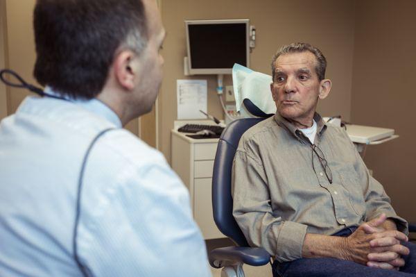 Dr. Ricciardi helping a patient