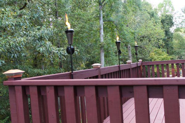 We designed and build this deck stain and weatherproof, added LED lighting and flame torch's.
 Stone Mountain, GA