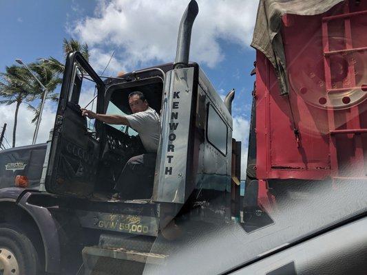 Jamming up traffic because he has tender feelings and can't handle a big rig.