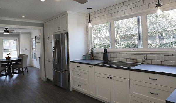 AFTER:  Cased opening instead of wall separating kitchen from dining room.