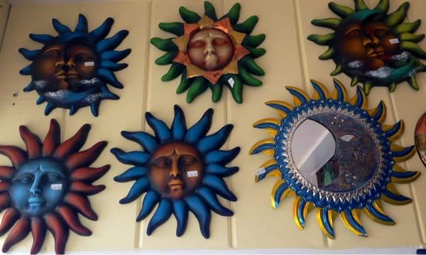 Ceramic wall suns and moons