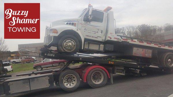 Our tow trucks are so strong they tow other tow trucks!