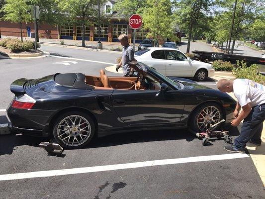 Car had to be skated to move to a towable location, tight parking lot.