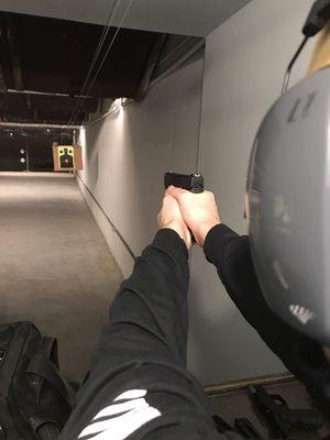 Student demonstrating proper grip technique & proper sight alignment