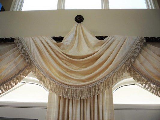 Traditional Custom Swag Treatment with Fringe.  Classic Beauty in Window Treatments