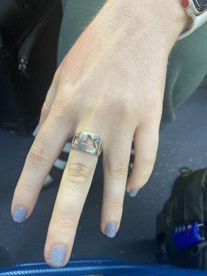 We were told this ring was real silver.  Paid $50 and it turned finger green!