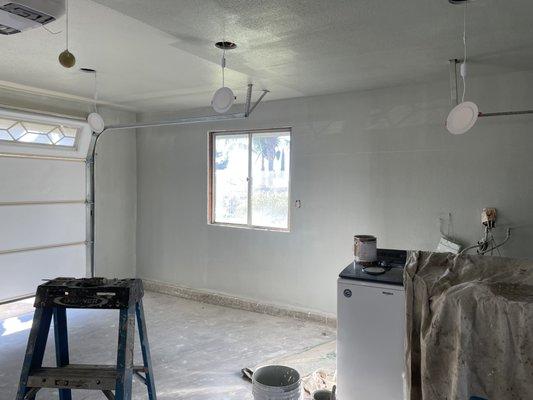 Garage remodel new ceiling new drywall and twxture