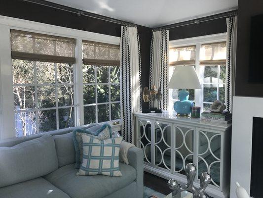 Custom woven shades, custom trim on drapery panels, custom lucite poles with  nickel hardware, custom pillow