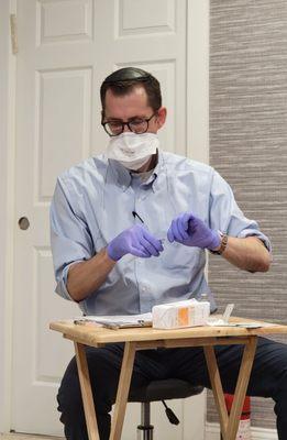 Dr. Peter Miller preparing a monoclonal antibody treatment.