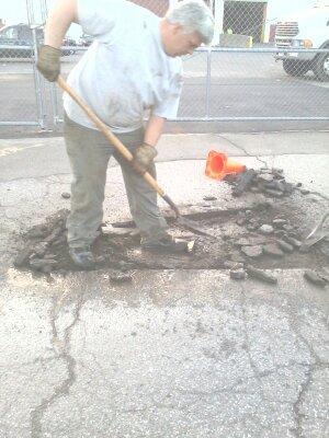 Prepping potholes to patch and repair them