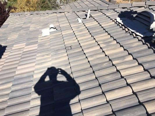 Concrete tile roof by golf course that we replaced many broken tiles from golf balls.