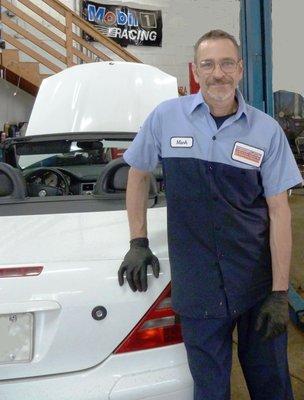 Mark C., Technician working on a Customer's Car