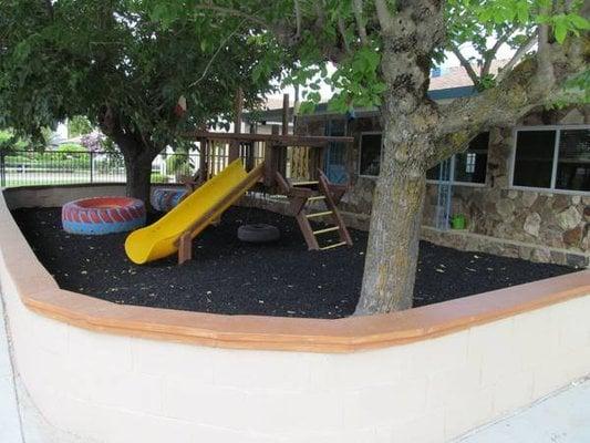 Our front playground is just one of our jungle gym areas where children are invited to move, learn, and strengthen their fine...