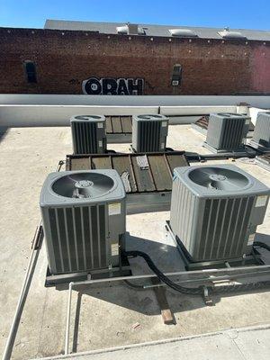 Rooftop HVAC units during our inspection in downtown Los Angeles. Fixing air conditioner unit for a big company