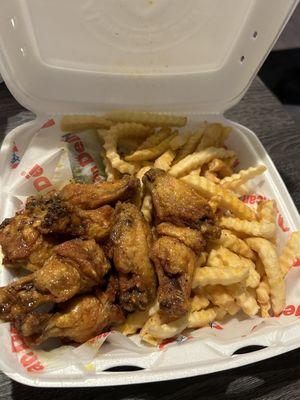 Lemon pepper wings and fries.