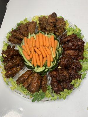 Hot wings barbecue wings sweet-and-sour wings and vegetables in Made for catering order