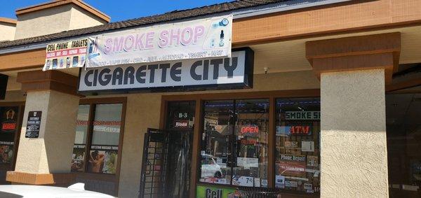 Cigarette City Smoke Shop storefront.